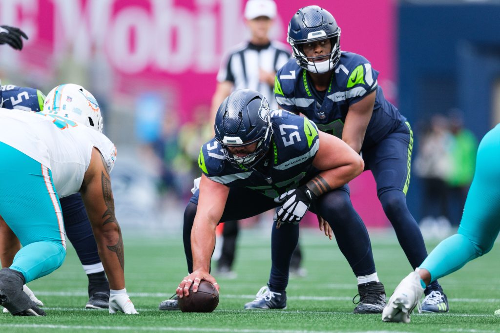 Seattle Seahawks center Connor Williams (57) prepares to snap the ball during the fourth quarter against the Miami Dolphins at Lumen Field. 