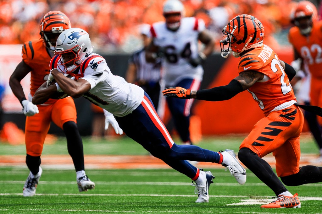 Tyquan Thornton runs with the ball during the Patriots' game against the Bengals on Sept. 8.