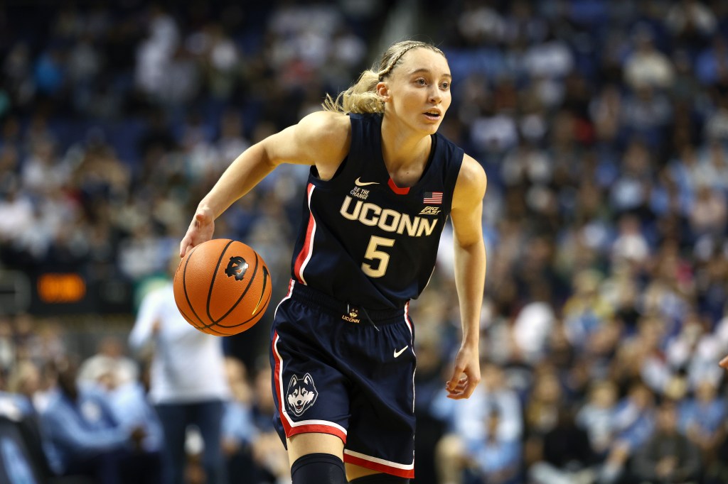 Paige Bueckers dribbles against the North Carolina Tar Heels at First Horizon Coliseum on November 15, 2024 in Greensboro, North Carolina.