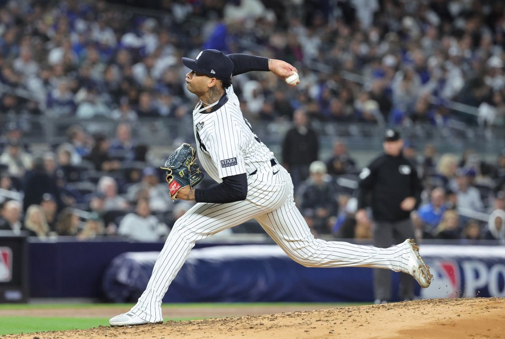 Yankees starting pitcher Luis Gil #81 throws a pitch during the second inning.