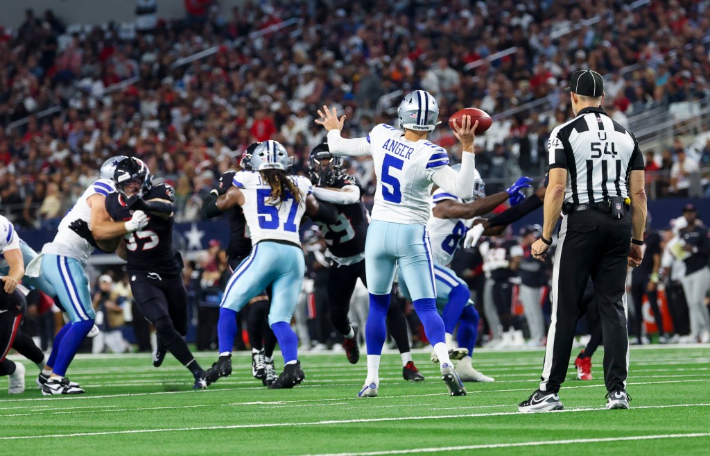 Cowboys punter Bryan Anger (5) attempts a fake punt during the first quarter against the Houston Texans.