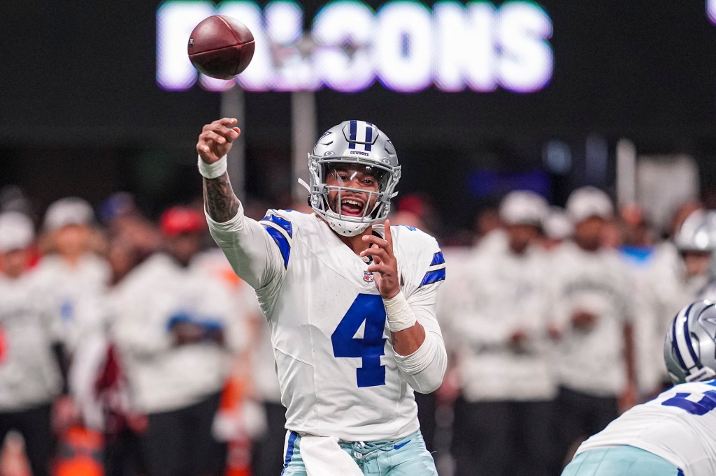 Dallas Cowboys quarterback Dak Prescott (4) throws a pass against the Atlanta Falcons during the second half at Mercedes-Benz Stadium. 