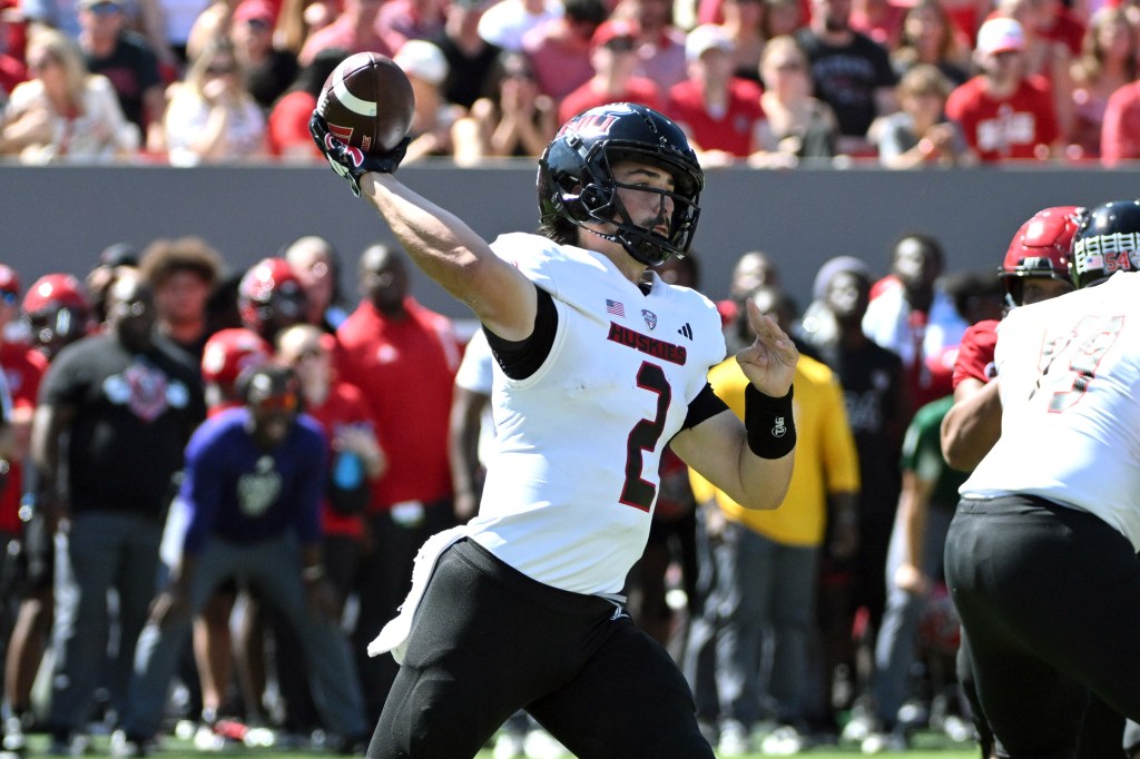 Northern Illinois Huskies quarter back Ethan Hampton (2) throws a pass against the North Carolina State Wolfpack during second quarter at Carter-Finley Stadium. 