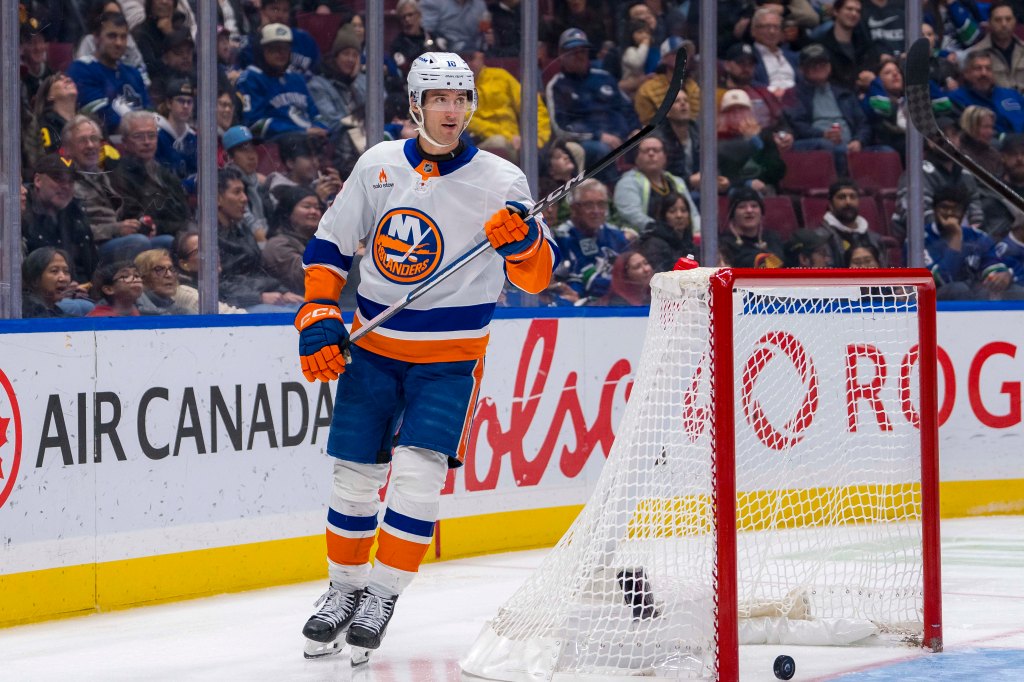 New York Islanders forward Pierre Engvall (18) celebrates his goal against the Vancouver Canucks during the second period at Rogers Arena. 