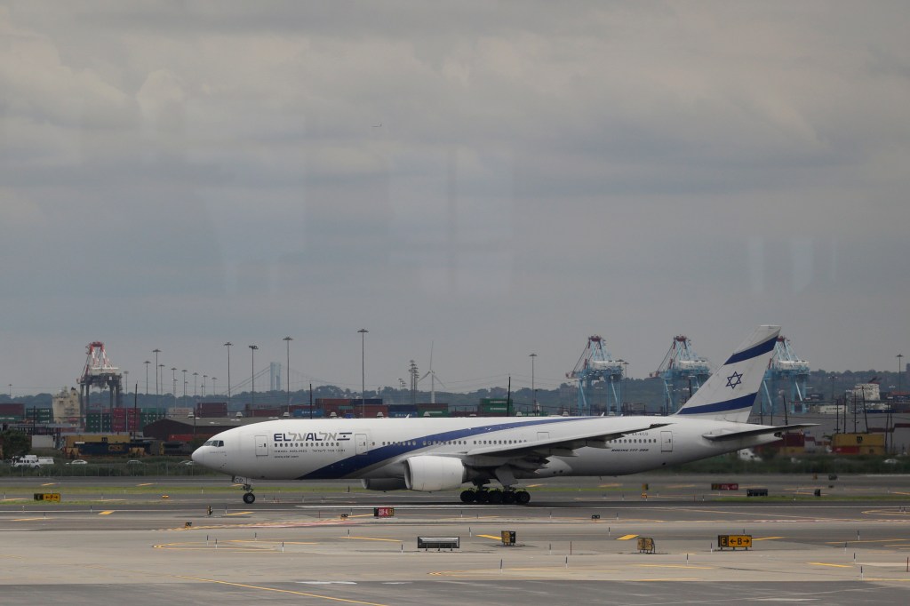 El Al Airlines Flight 28 races on the runway at Newark Liberty International Airport moments before taking off en route to Tel Aviv's Ben Gurion Airport, Thursday, July 24, 2014, in Newark, N.J. El Al Airlines continued its normal flight schedules to Israel during a two-day hiatus by U.S. airlines caused by combat in the Gaza Strip. The Chicago-based airline says it will resume service to Ben Gurion Airport in Tel Aviv with a 4:45 p.m. eastern flight from Newark Liberty International Airport in New Jersey. A second United flight will leave Newark at 10:50 p.m. eastern. The decision comes hours after the Federal Aviation Administration lifted its ban on U.S. flights in and out of Israel, which the agency had imposed out of concern for the risk of planes being hit by Hamas rockets. (AP Photo)