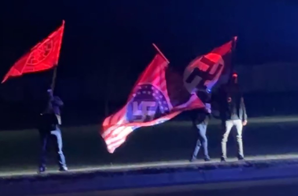 A group of people were seen waving Nazi flags in Howell, Michigan on Saturday night. 