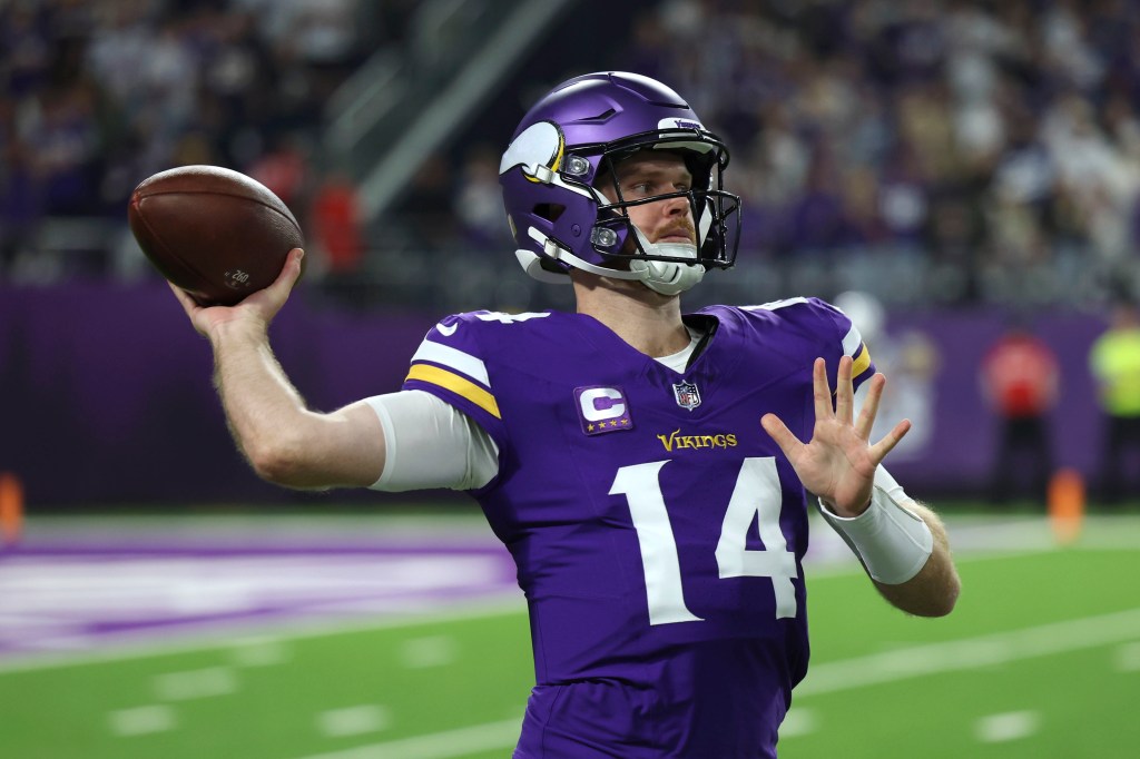 Minnesota Vikings quarterback Sam Darnold (14) throws a pass during the first half of an NFL football game against the Indianapolis Colts, Sunday, Nov. 3, 2024, in Minneapolis.