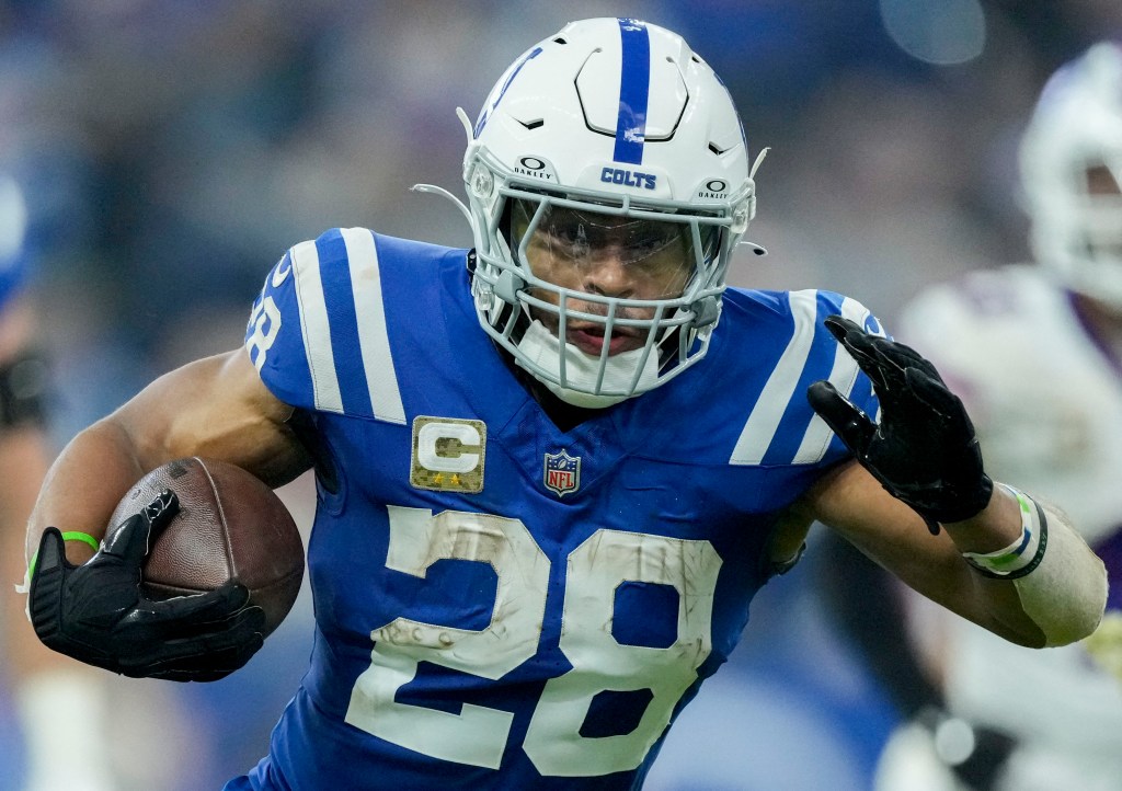 Indianapolis Colts running back Jonathan Taylor (28) rushes the ball Sunday, Nov. 10, 2024, during a game against the Buffalo Bills at Lucas Oil Stadium in Indianapolis.