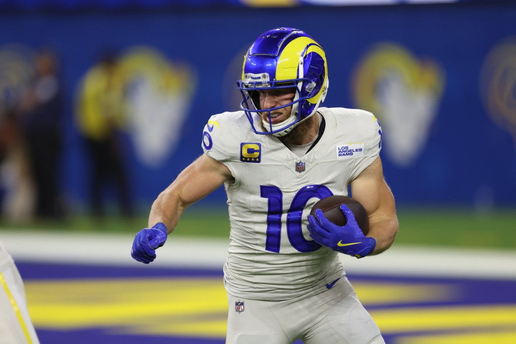 Cooper Kupp #10 of the Los Angeles Rams runs the ball against the Minnesota Vikings in the second quarter at SoFi Stadium on October 24, 2024 in Inglewood, California.