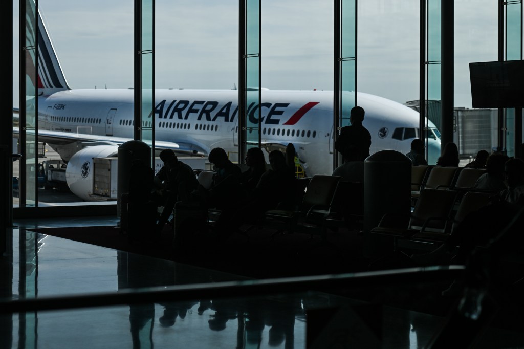 A photo of an Air France plane at Charles de Gaulle Airport in Paris.