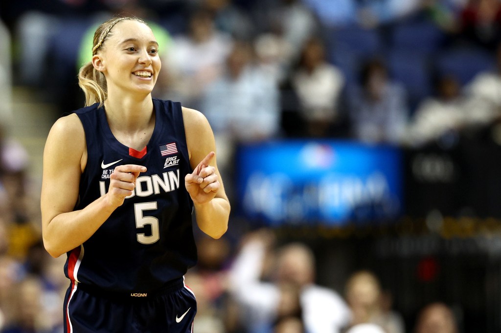 Paige Bueckers #5 of the UConn Huskies reacts during the second half of the game against the North Carolina Tar Heels at First Horizon Coliseum on November 15, 2024 in Greensboro, North Carolina.