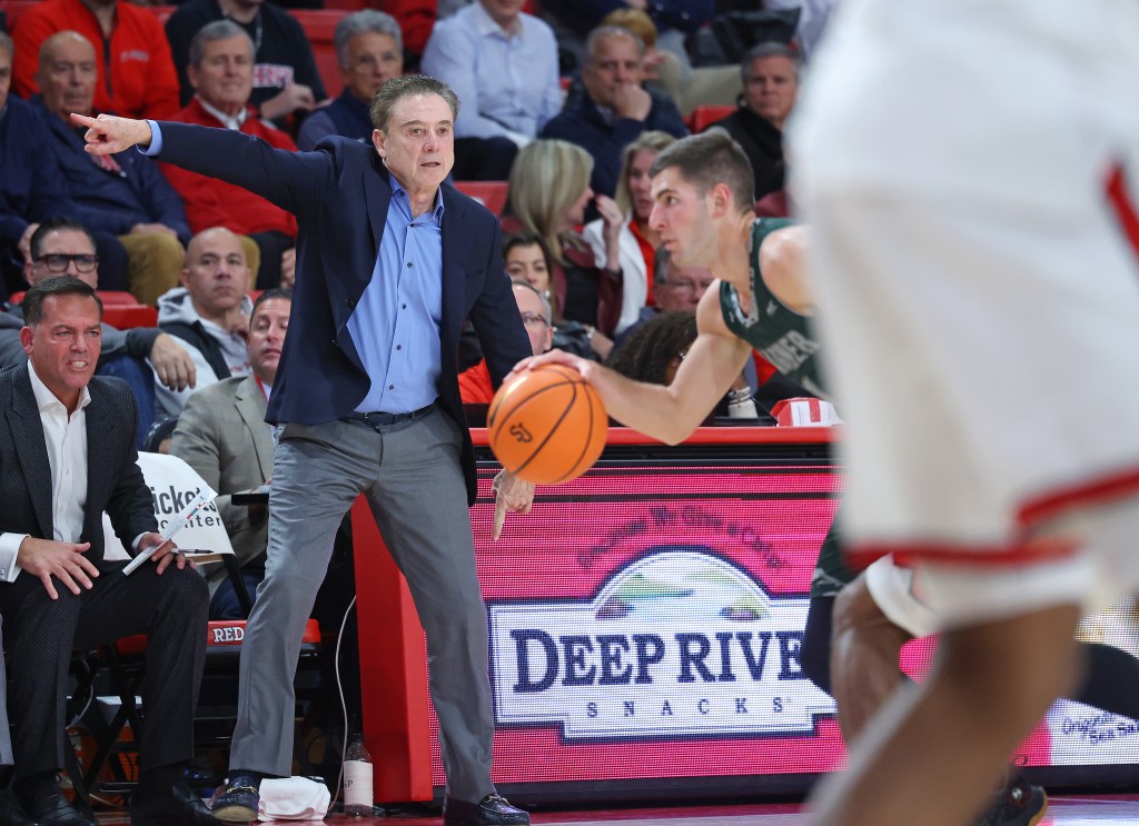 St. John's Red Storm head coach Rick Pitino gets vocal with his team during the first half when the St. John's Red Storm played the Wagner Seahawks