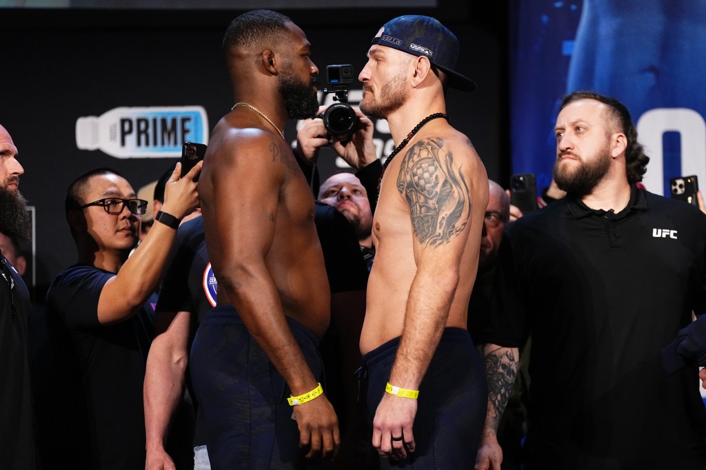 Opponents Jon Jones and Stipe Miocic face off during the UFC 309 ceremonial weigh-in at The Theater at Madison Square Garden on November 15, 2024 in New York City. 