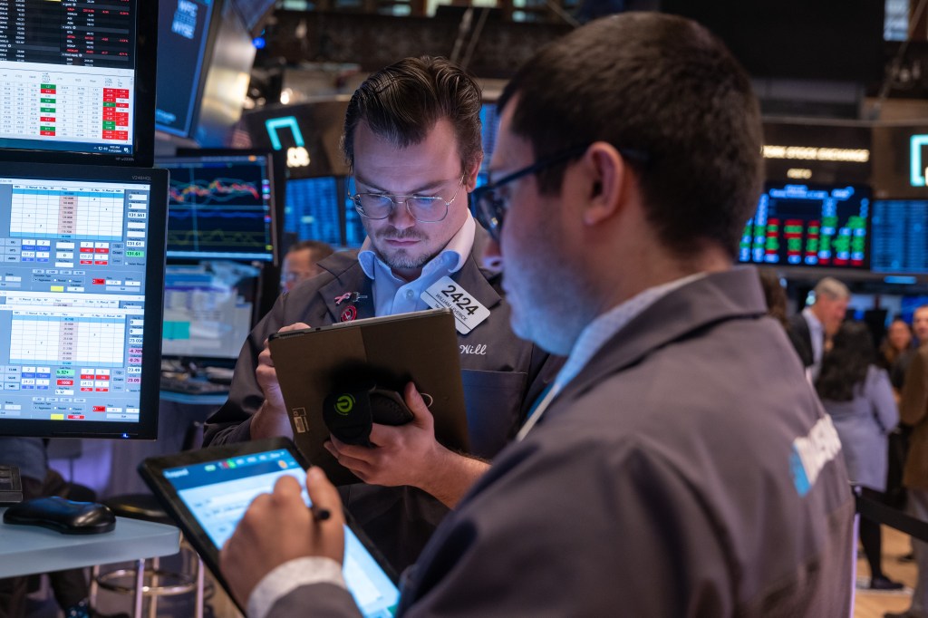 Traders work on New York Stock Exchange on Nov. 12.