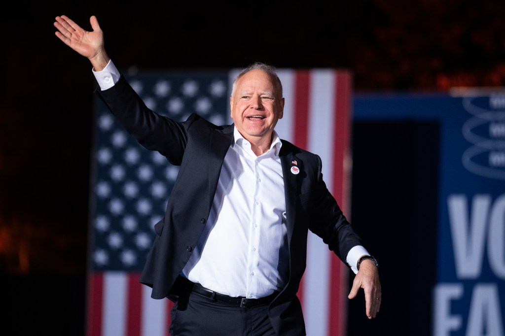 Minnesota Governor Tim Walz, running mate of Vice President Kamala Harris, Democratic nominee for president, arrives to speak during a rally at Burns Park in Ann Arbor, Mich., on Monday, October 28, 2024