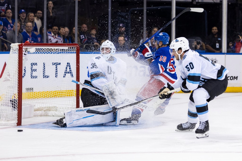 Will Cuylle #50 of the New York Rangers takes a shot on goal that is deflected by Utah Hockey Club Connor Ingram in the first period at Madison Square Garden, Saturday, Oct. 12, 2024, in New York, NY. 