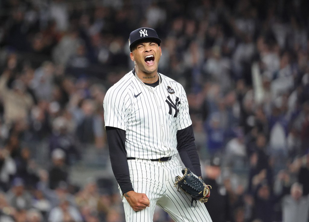 Yankees starting pitcher Luis Gil #81 reacts after he believed he got a double play but was a forced out during the fourth inning.