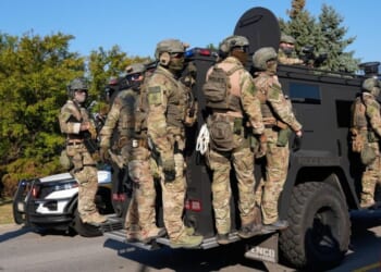 Woman shot after allegedly attempting to hit ICE agents with car