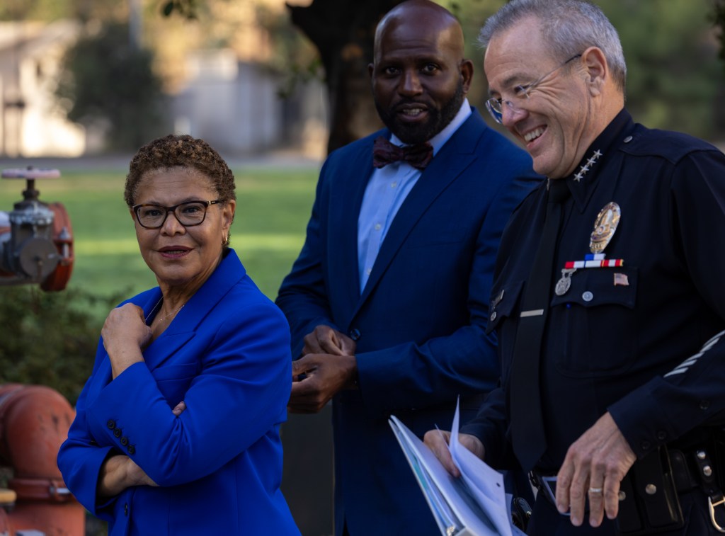 Mayor Karen Bass, Deputy Mayor of Public Safety Brian K. Williams, and LAPD Chief Michel Moore at a press conference.