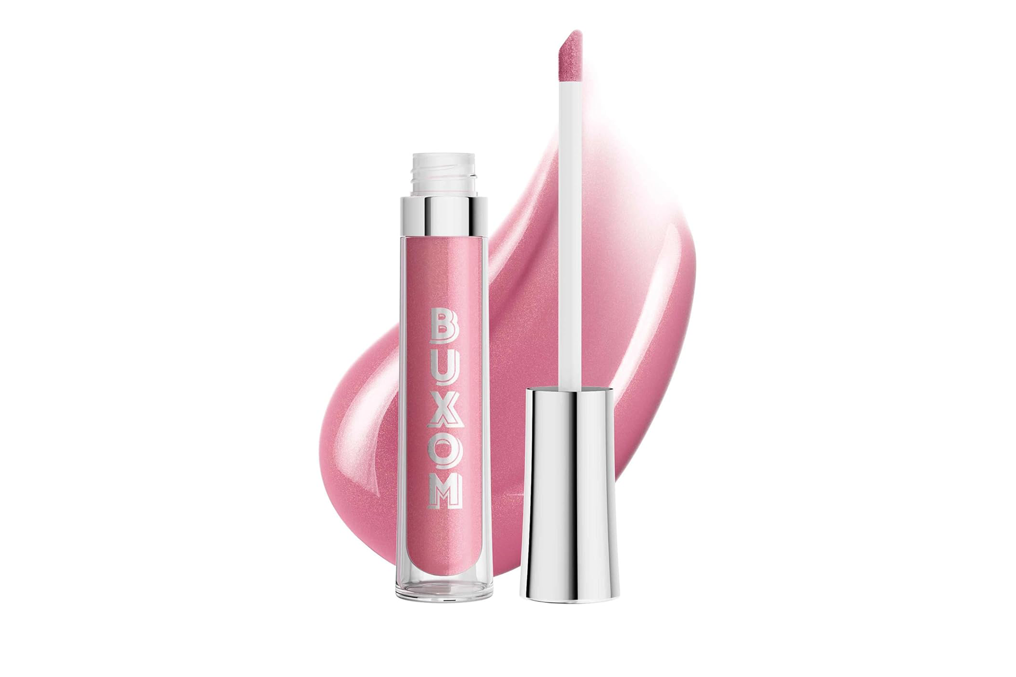Buxom lip gloss in a clear tube with a silver cap, next to its applicator on a pink swatch.
