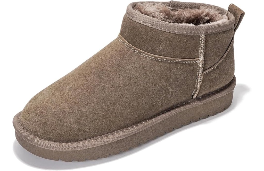 Single brown fur-lined boot.