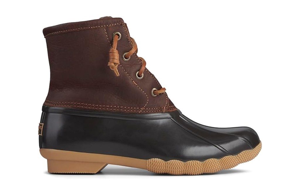 A brown leather and black rubber Sperry duck boot with tan laces and a tan sole.