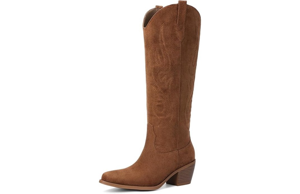 Brown cowboy boot with intricate stitching.