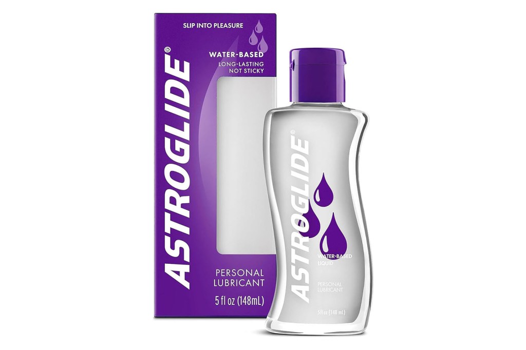 A bottle of liquid in a purple box