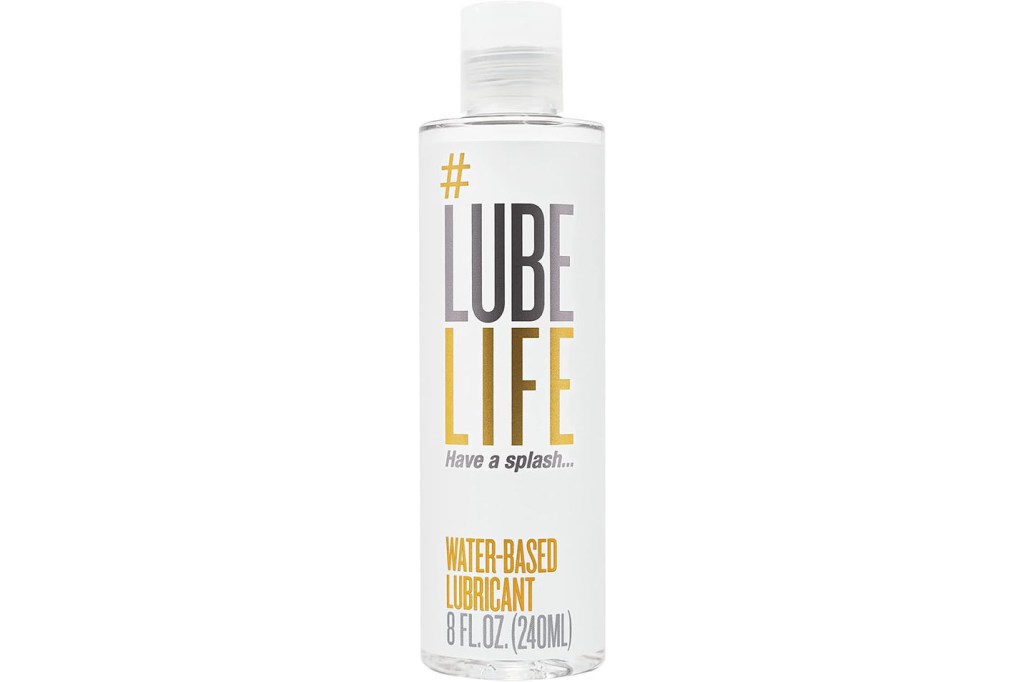 A bottle of liquid with a white label