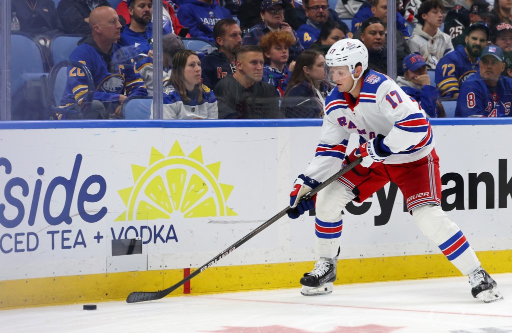 Will Borgen gains control of the puck during the Rangers' road win over the Sabres.