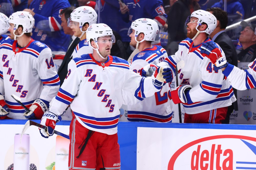 Alexis Lafrenière celebrates his first period goal against the Buffalo Sabres during an NHL game on October 09, 2025 at KeyBank Center in Buffalo, New York.