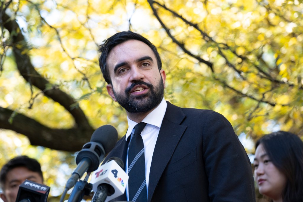 New York State Representative and Mayoral Candidate Zohran Mamdani speaking at a press conference with microphones from T47 and NBC 4.