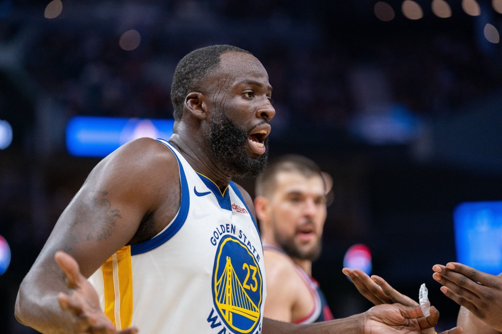 Golden State Warriors forward Draymond Green (23) reacts on a call against the LA Clippers during the third quarter at Chase Center.