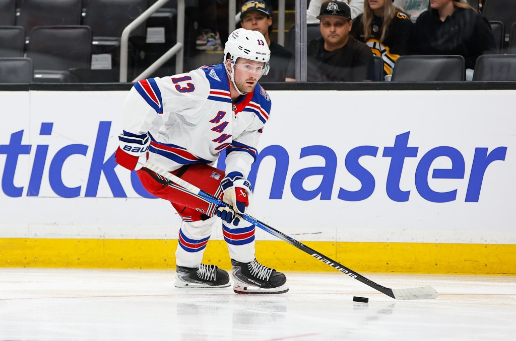 Alexis Lafrenière #13 of the New York Rangers skates against the Boston Bruins during the first period at the TD Garden during a preseason game on October 4, 2025 in Boston, Massachusetts. The Bruins won 4-1. 