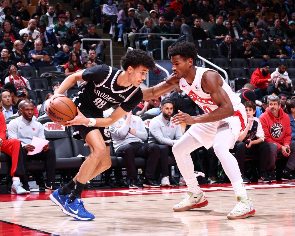 Nolan Traore #88 of the Brooklyn Nets looks to pass the ball during the game against the Toronto Raptors on October 17, 2025 at the Scotiabank Arena in Toronto, Ontario, Canada.
