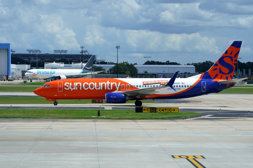 A Sun Country Airlines plane on the tarmac at Tampa International Airport.