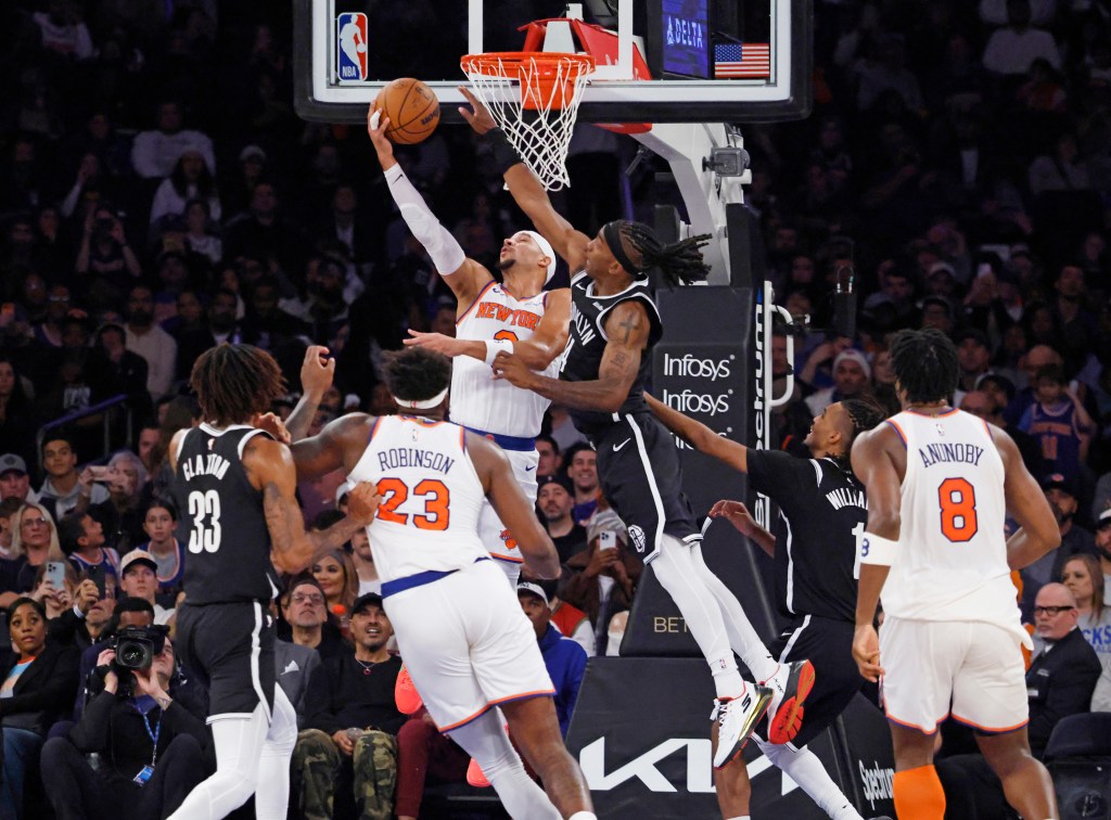 Josh Hart #3 of the New York Knicks goes up for a shot during the first half.