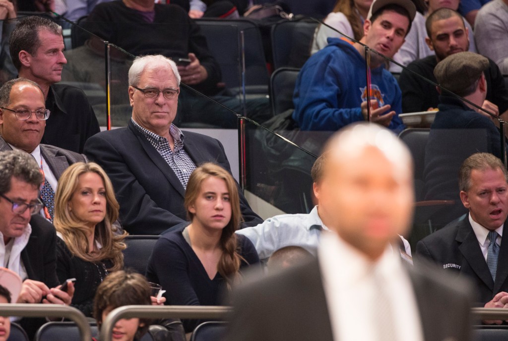New York Knicks president Phil Jackson watches game play.