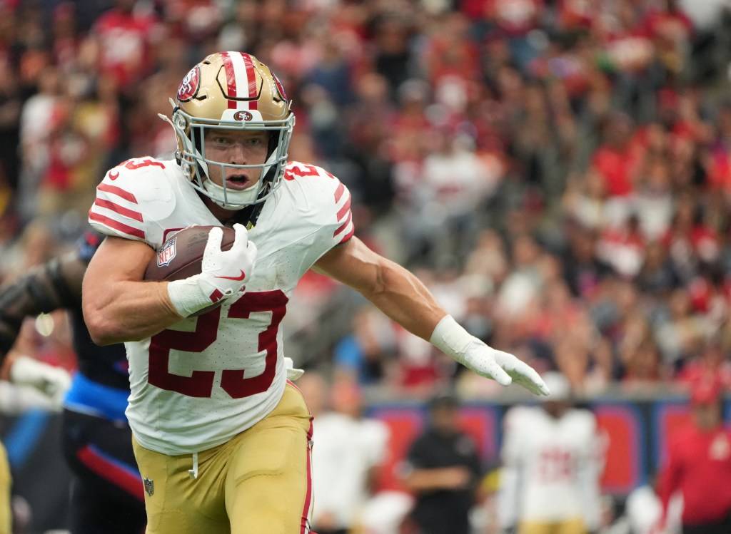 San Francisco 49ers running back Christian McCaffrey (23) runs for a gain during the second half against the Houston Texans at NRG Stadium. 