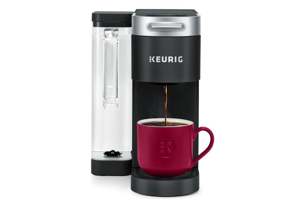 Keurig Supreme Coffee Maker with a cup of coffee