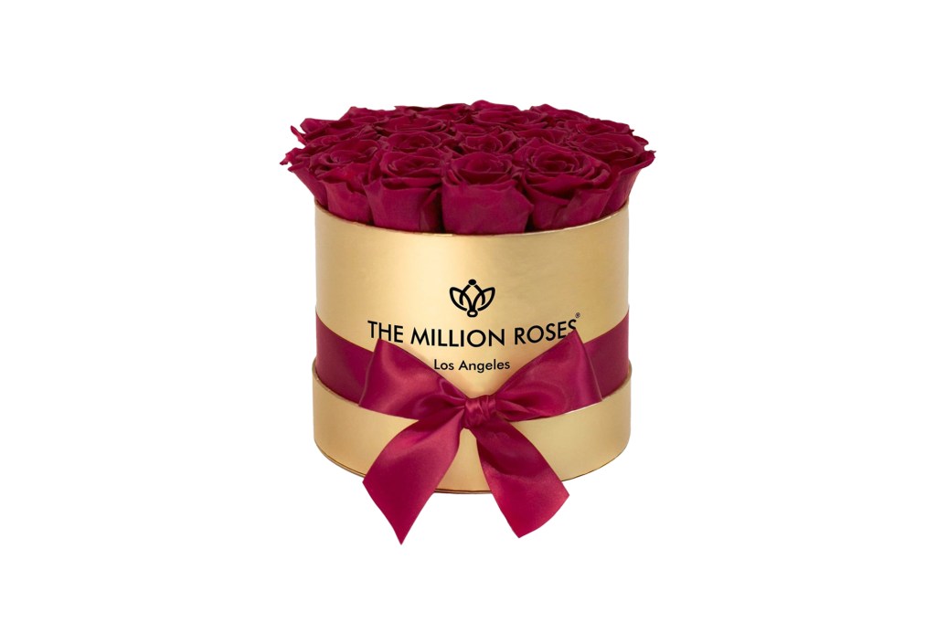 A box of roses wrapped with a bow