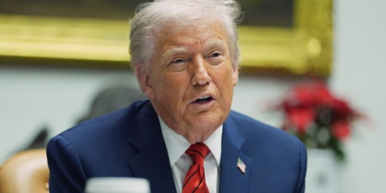 Green group files suit to keep Trump's face off National Parks pass