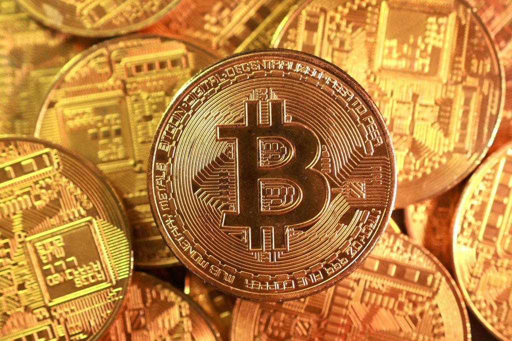 Illustration of a gold Bitcoin coin cryptocurrency.