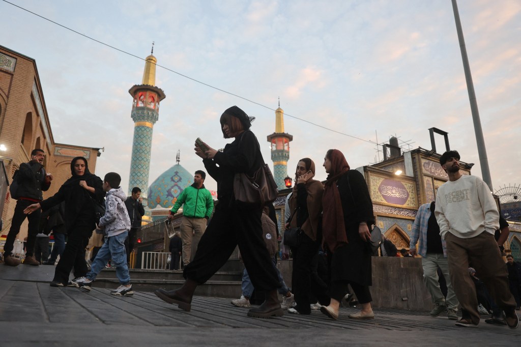 People walk in Tajrish Bazaar in Tehran.
