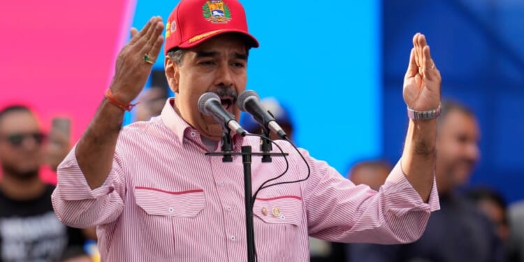 Maduro dances, sings to 'Don't Worry, Be Happy' at rally as Trump escalates