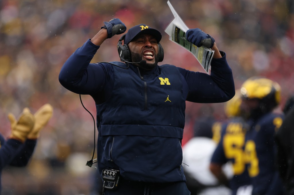 Head coach Sherrone Moore of the Michigan Wolverines reacts on the sideline during the first quarter against the Ohio State Buckeyes at Michigan Stadium on November 29, 2025 in Ann Arbor, Michigan.