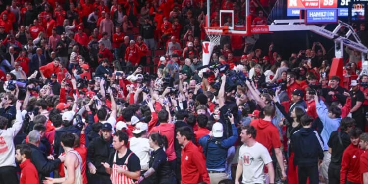Unbeaten Nebraska actually wants fans to stop storming court
