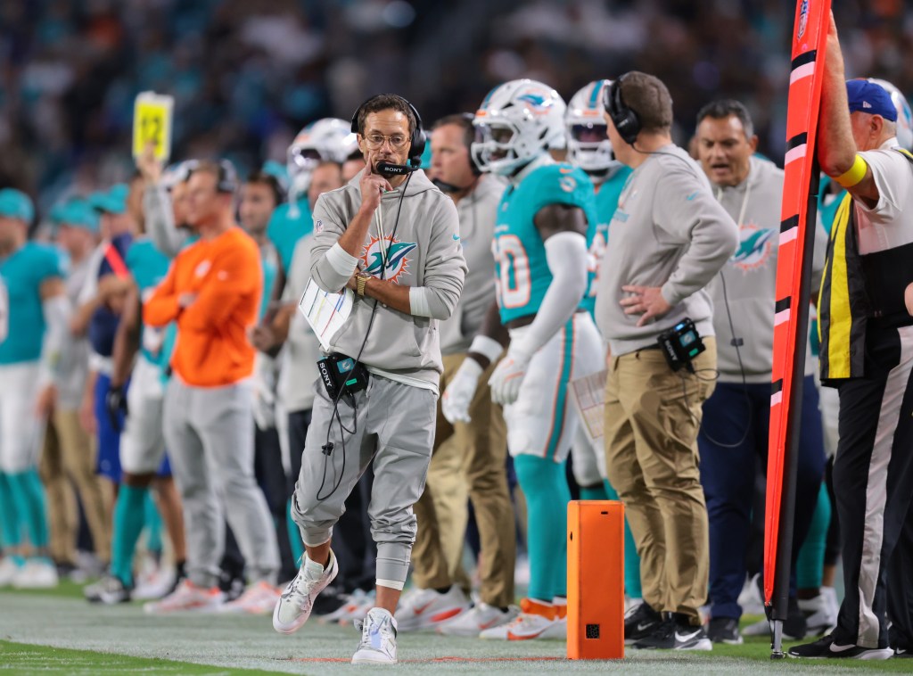 Miami Dolphins head coach Mike McDaniel on the sidelines during a game.