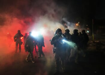 Tensions in Minneapolis rise as Trump threatens to invoke Insurrection Act