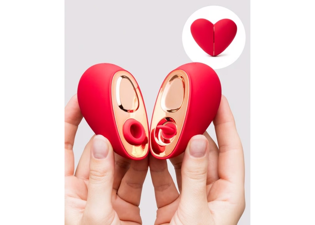 Two hands holding parts of a red heart-shaped toy with a gold interior, with a small inset of the fully assembled heart toy.